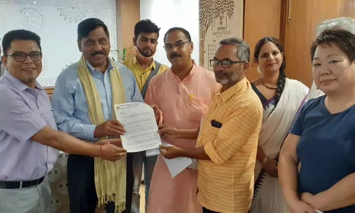 NFHH representatives Macherla Mohan Rao and others submitting a representation to Secretary, Ministry of Textiles, Upendra Prasad Singh in New Delhi on Wednesday
