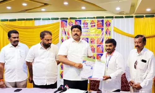 HRCI South India region chairman Shaik Khalifatulla Basha handing over appointment order to A Vijaya Kumar in Ongole  on Wednesday