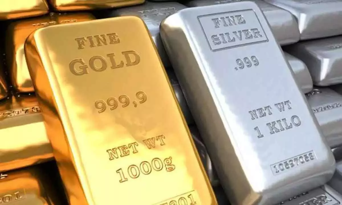 Gold, silver prices edge down