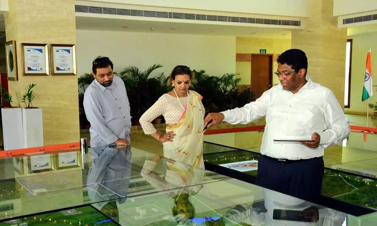 Sri City MD Ravindra Sannareddy explaining the unique features of business city to the visiting dignitaries.