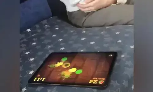 Watch The Trending Video Of A Kitten Playing Game On Tablet