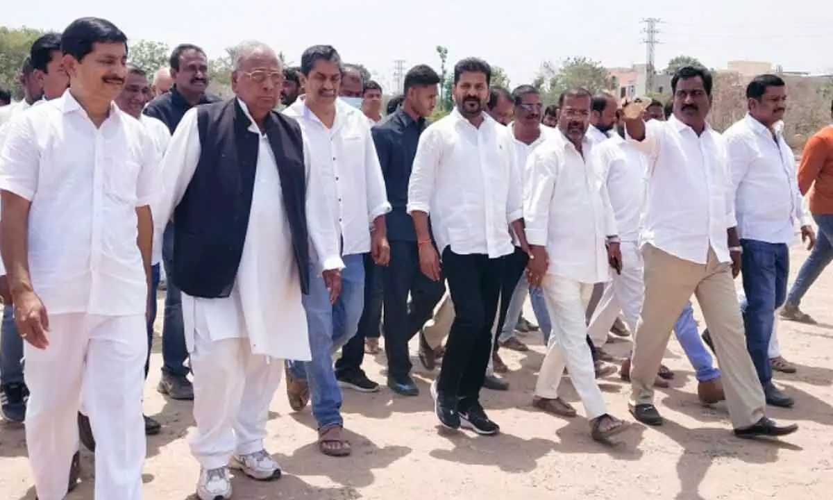 TPCC president A Revanth Reddy and others inspecting Arts and Science College Grounds in Hanumakonda on Monday
