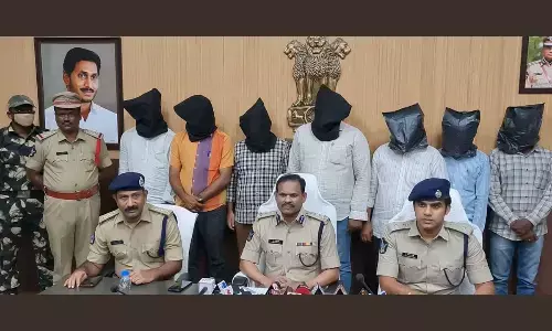 M.Ravi Prakash, DIG, AnantaAnantapur is seen addresding the media here on Friday .Chittoor SP Rishanth Reddy (right) is also seen