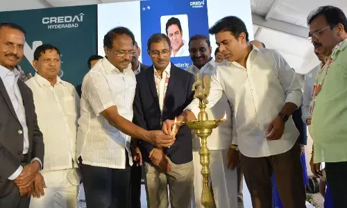 Minister for IT, Industries and MAUD KT Rama Rao lighting the lamp during the 11th edition of Credai Hyderabad property show.  Photo: Ch Prabhu Das