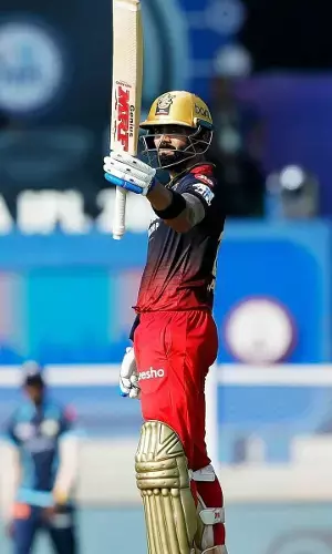 Kohli gets the loudest cheer from Anushka as he reaches 50 vs GT [Video]