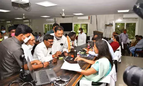 Collector Nagalakshmi Selvarajan receiving petitions at Spandana programme in Anantapur on Monday.