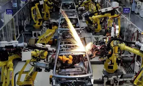 Factory output gains steam despite high April inflation