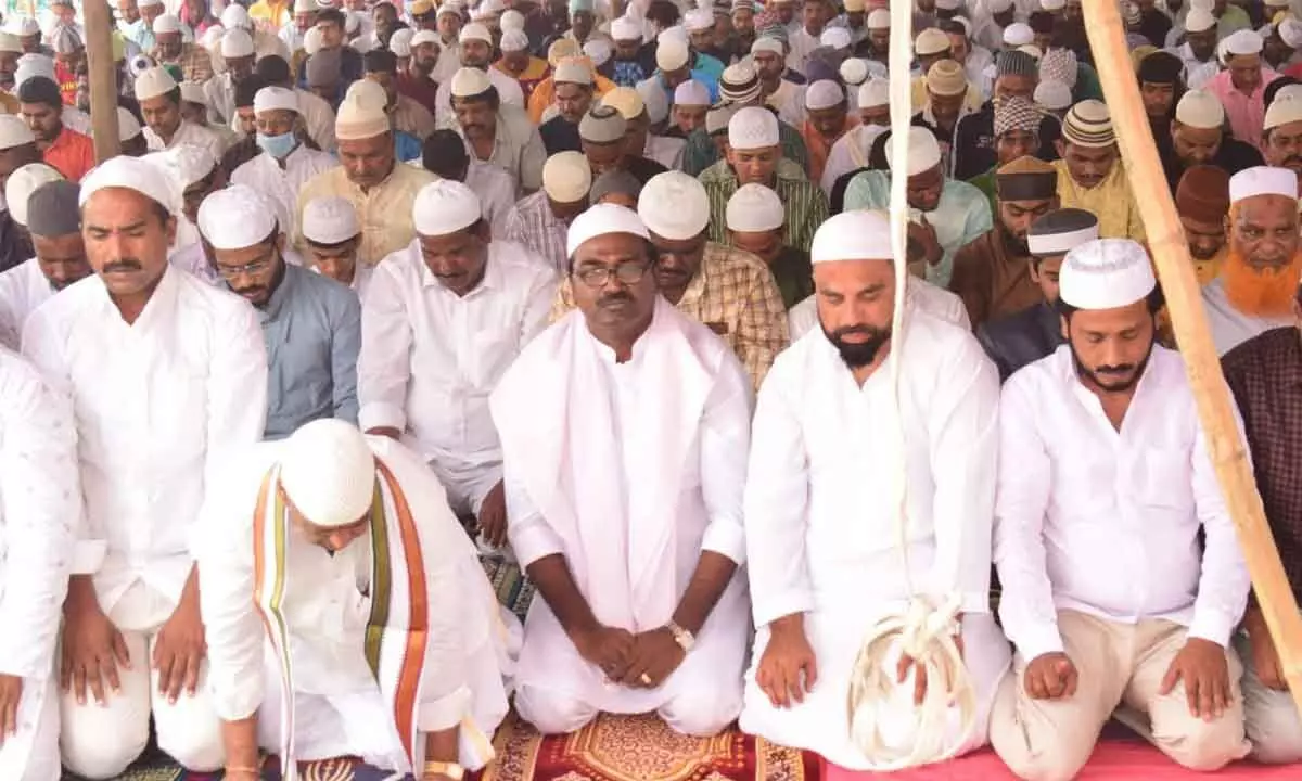 Minister for Transport Puvvada Ajay Kumar participating in Namaz at a mosque in Khammam on Tuesday.