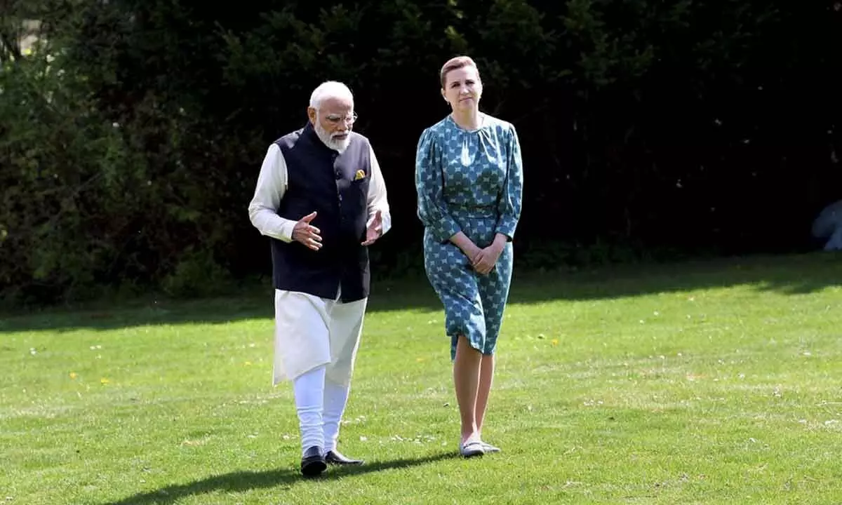 Prime Minister Narendra Modi with Prime Minister of Denmark Mette Frederiksen upon his arrival in Copenhagen, Denmark, on Tuesday