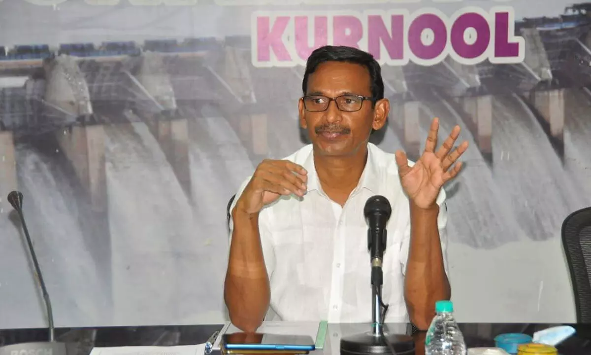 District Collector  P Koteswara Rao speaking to officials at a meeting in Kurnool on Tuesday