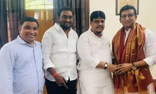 Minority leaders Sajid Khan Sukoor & Dr Amit exchanging greetings in Karimnagar on Tuesday