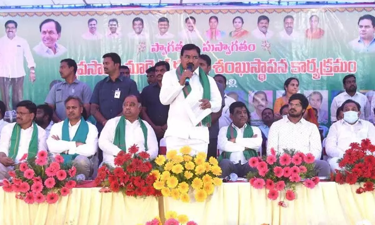 Agriculture Minister Singireddy Niranjan Reddy speaking at a meeting after launching various development works in Khammam on Wednesday