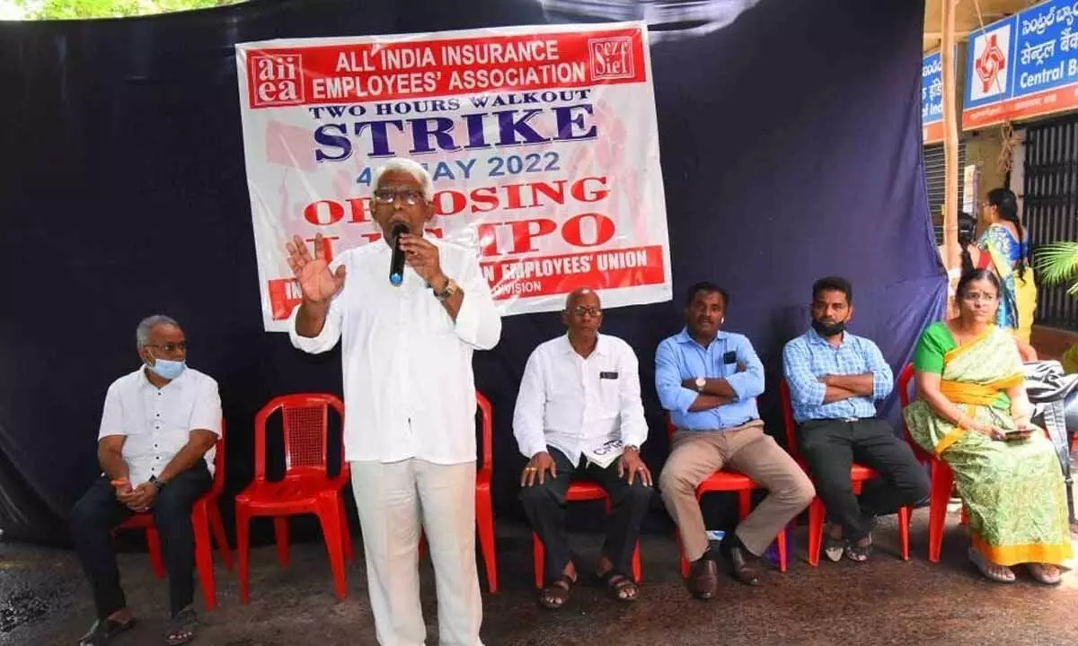 CITU AP state committee leader Ch Narasinga Rao addressing the gathering at a protest organised  by LIC in Visakhapatnam on Wednesday