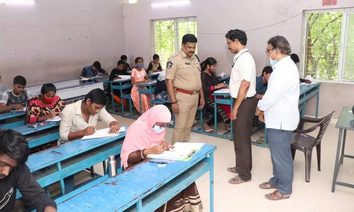 Kakinada District Superintendent of Police M Ravindranath Babu inspecting an examination centre in Kakinada on Wednesday