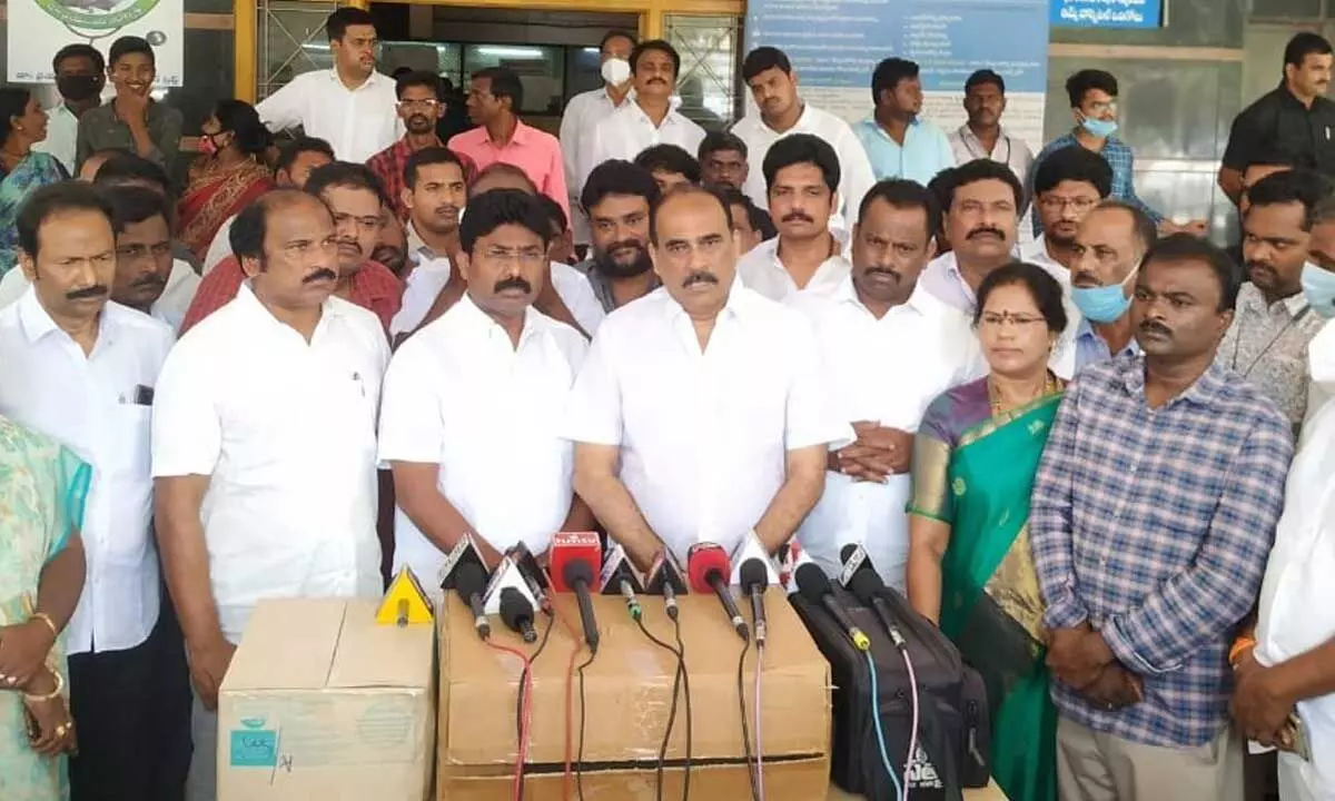 Former Minister Balineni Srinivasa Reddy speaking to the media in Ongole on Wednesday.  Minister Audimulapu Suresh and others are also seen.