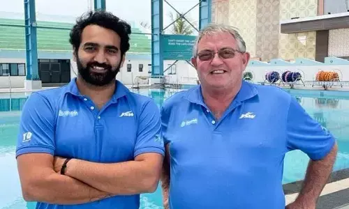 South African swim coach Douglas Eager and Olympian and Asian Games medalist Sandeep Sejwal