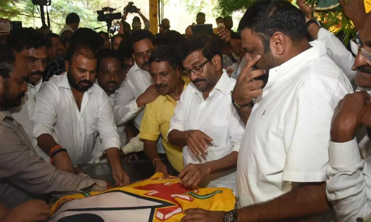 TDP polit bureau member Somireddy Chandramohan Reddy paying homage at the mortal remains of former minister Bojjala Gopalakrishna Reddy in Srikalahasti on Saturday. TDP Tirupati parliament president G Narasimha Yadav and B Sudheer Reddy are also seen.