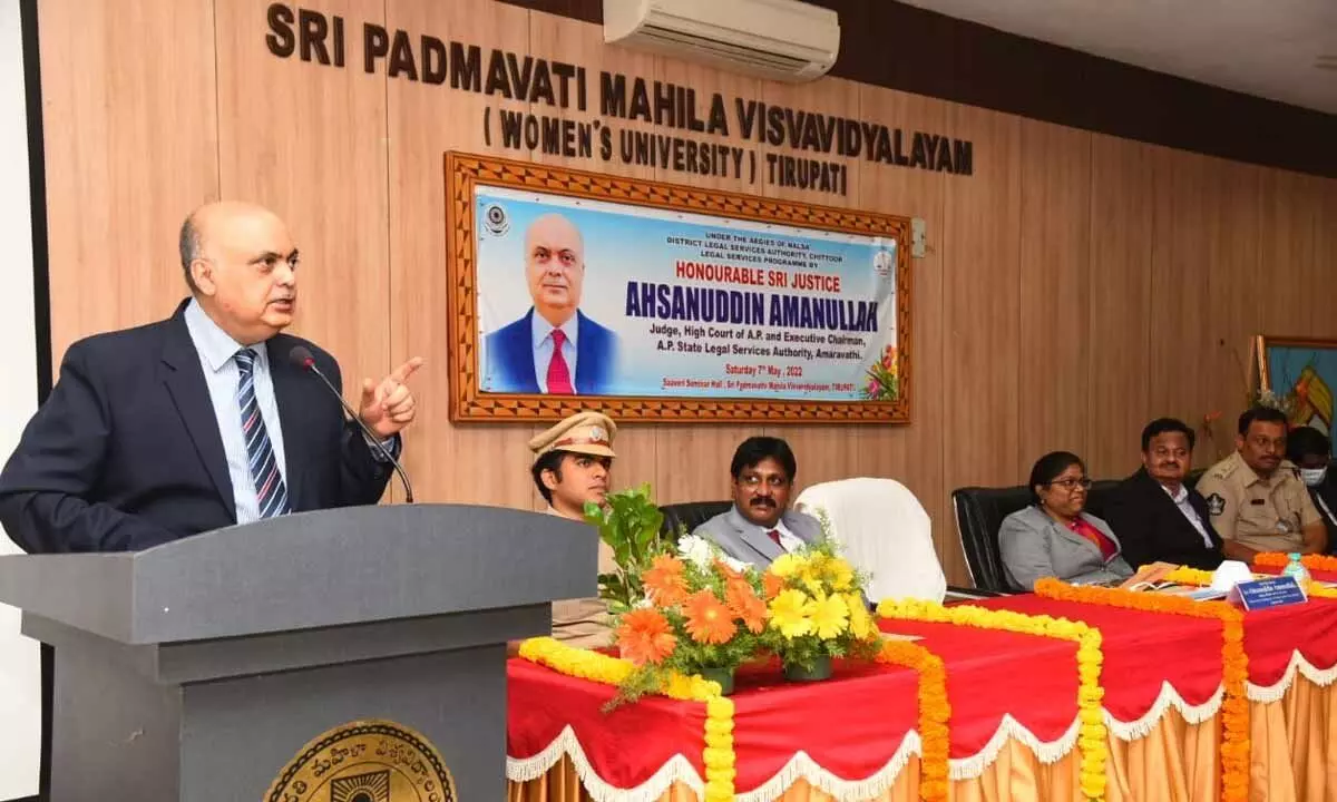 AP High Court judge Justice Ahasanuddin Amanullah addressing the legal services programme held at SPMVV in Tirupati on Saturday. Collector K Venkata Ramana Reddy, SP P Parameswar Reddy and others are also seen.