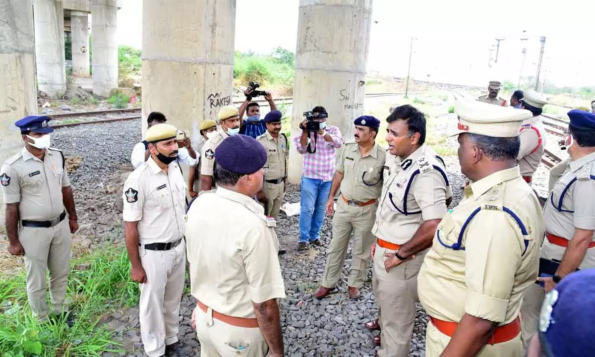 Commissioner of Police Kanthi Rana Tata, Senior Divisional Security Commissioner RPF Valleawara, BT and other officials inspecting railway station and track area in Vijayawada on Monday. 	Photo: Ch Venkata Mastan