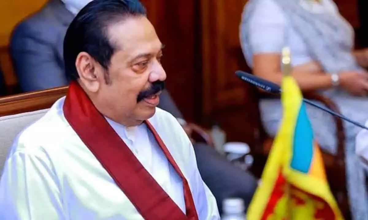 Rajapaksa, family flee to Naval base