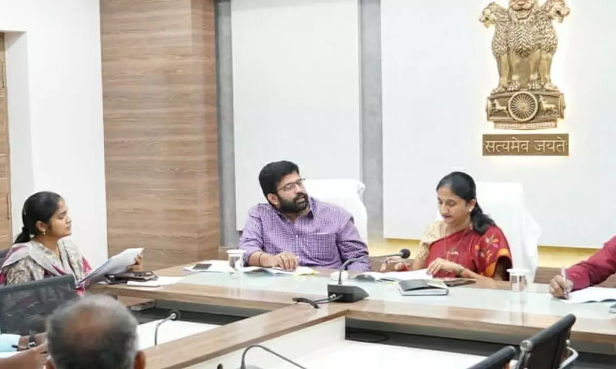 District Collector Dr K Madhavi Latha reviewing distribution of house sites in Rajanagaram constituency along with MLA Jakkampudi Raja on Tuesday