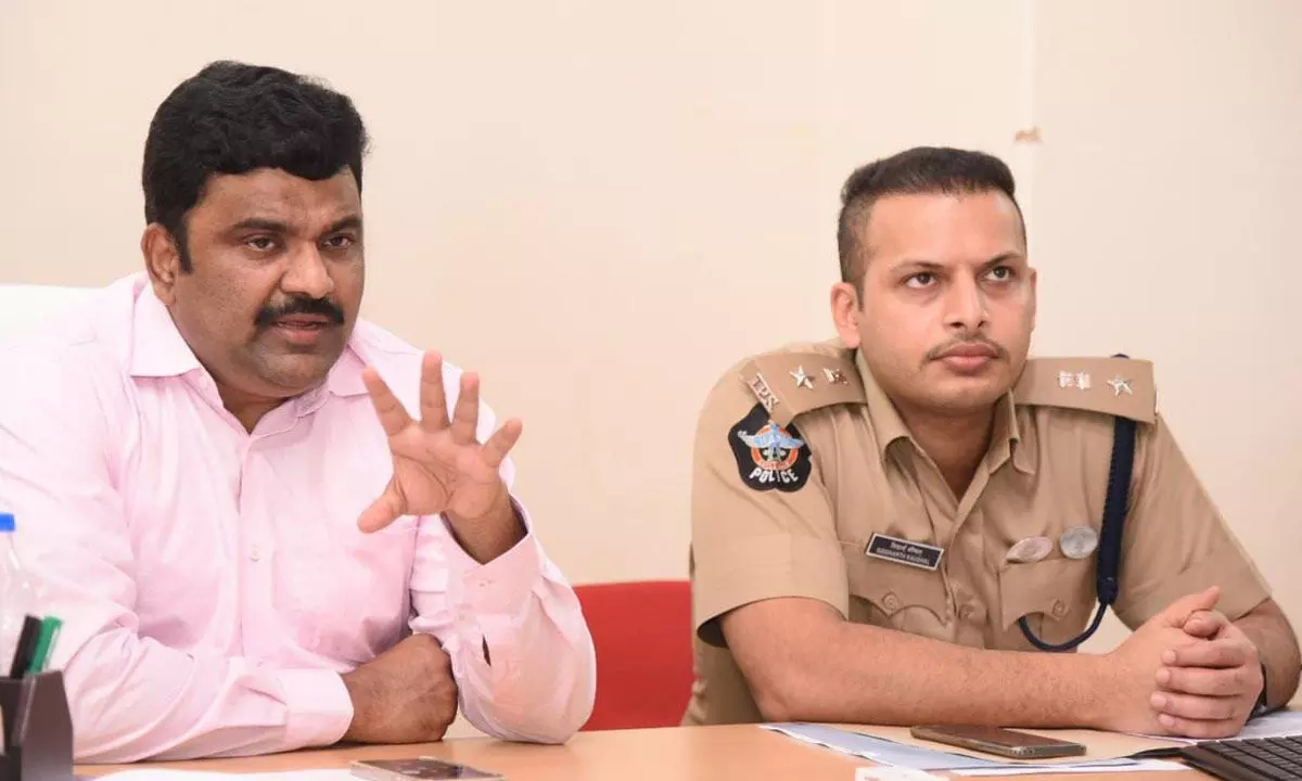 Krishna District Collector Ranjit Basha speaking at a meeting in Machilipatnam on Tuesday. SP Siddharth Kaushal is also seen.