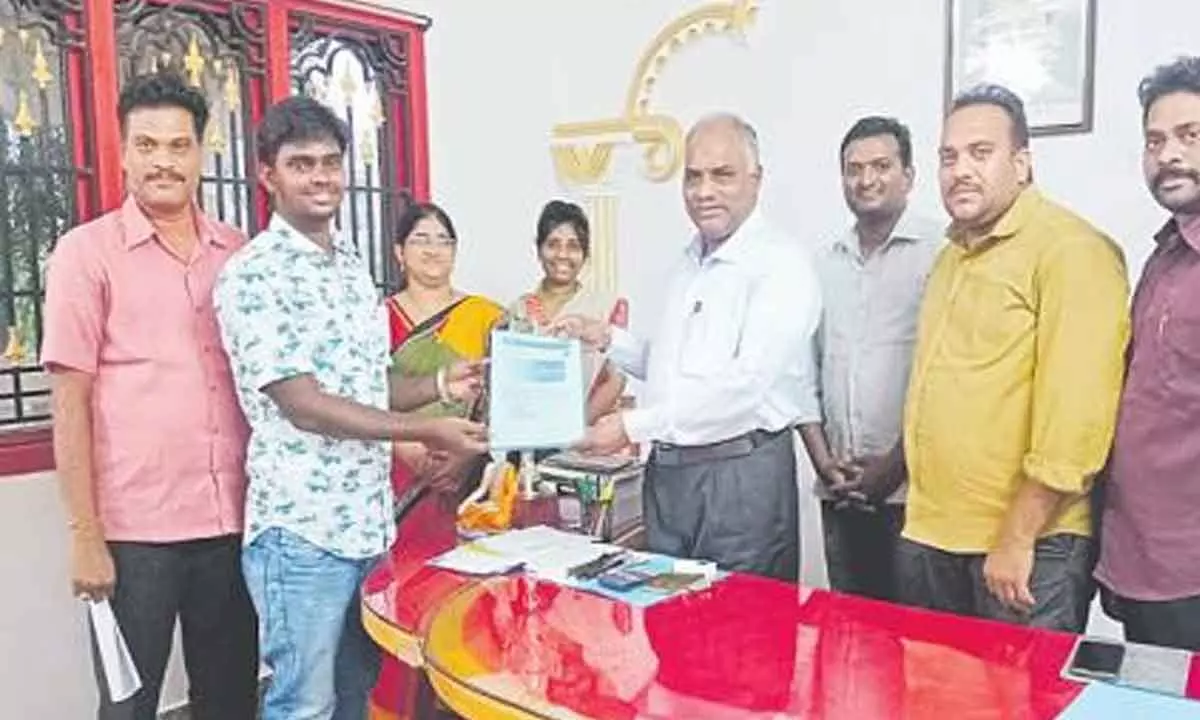 IIIT College Director B. Jayarami Reddy has handed over the offer letter to Ajay