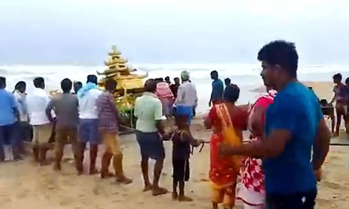 Gold colour chariot structure found at ashore in Srikakulam district