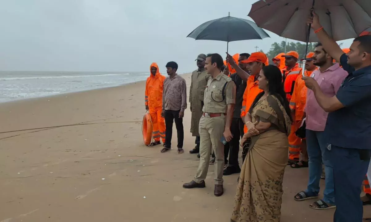 Bapatla District Collector Vijaya Krishnan and SP Vakul Jindal at Suryalanka Beach on Wednesday