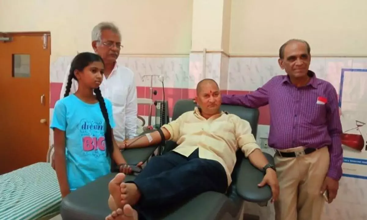 Red Cross Society sets example, donates blood for 59th time