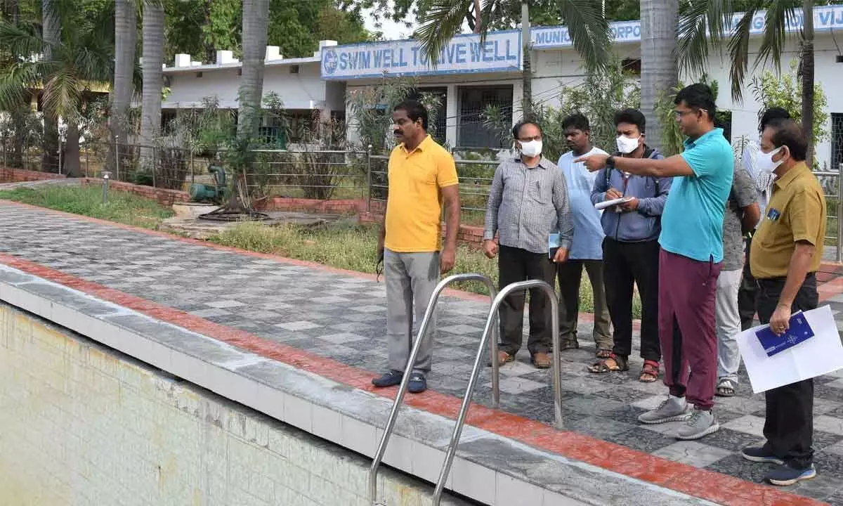 VMC Commissioner Swapnil Dinkar Pundkar inspecting VMC swimming pools in Gandhi Nagar in Vijayawada on Thursday