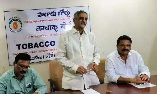 Tobacco Board Chairman Yadlapati Raghunadha Babu speaking at a review meeting in Ongole on Thursday