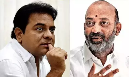 Minister KT Rama Rao and Bandi Sanjay Kumar