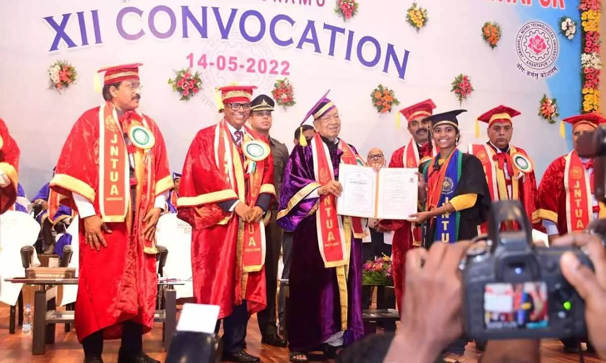Governor Biswa Bhusan Harichandan distributing certificates to students at JNTUA 12th convocation in Anantapur on Saturday