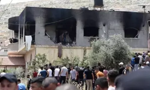 13 Palestinians injured in clashes at West Bank refugee camp