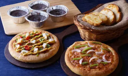 Doctor finds his calling, business of pizzas!