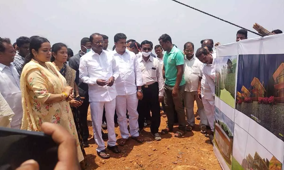 Ravi Babu watches the photo exhibition at Adali