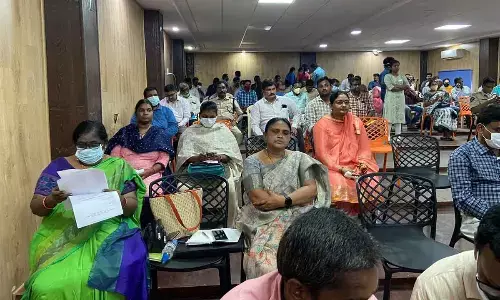 People waiting to submit petitions at East Godavari district Collectorate in Rajamahendravaram during Spandana programme on Monday