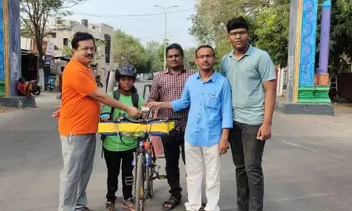 A Studnet  B Vennela on Yycle Yatra  named “Save  soil”