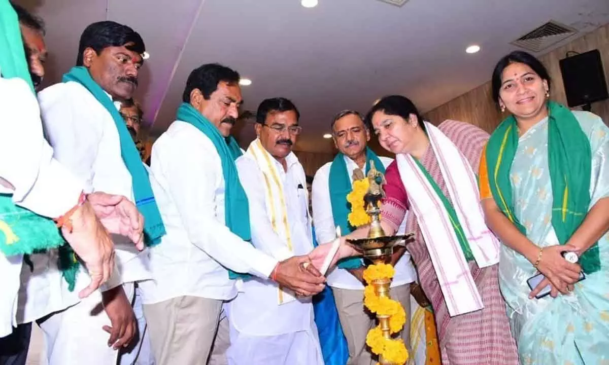 Ministers S Niranjan Reddy, Errabelli Dayakar Rao and Satyavathi Rathod lighting the lamp at the preparatory meeting of kharif cultivation in Hanumakonda on Tuesday