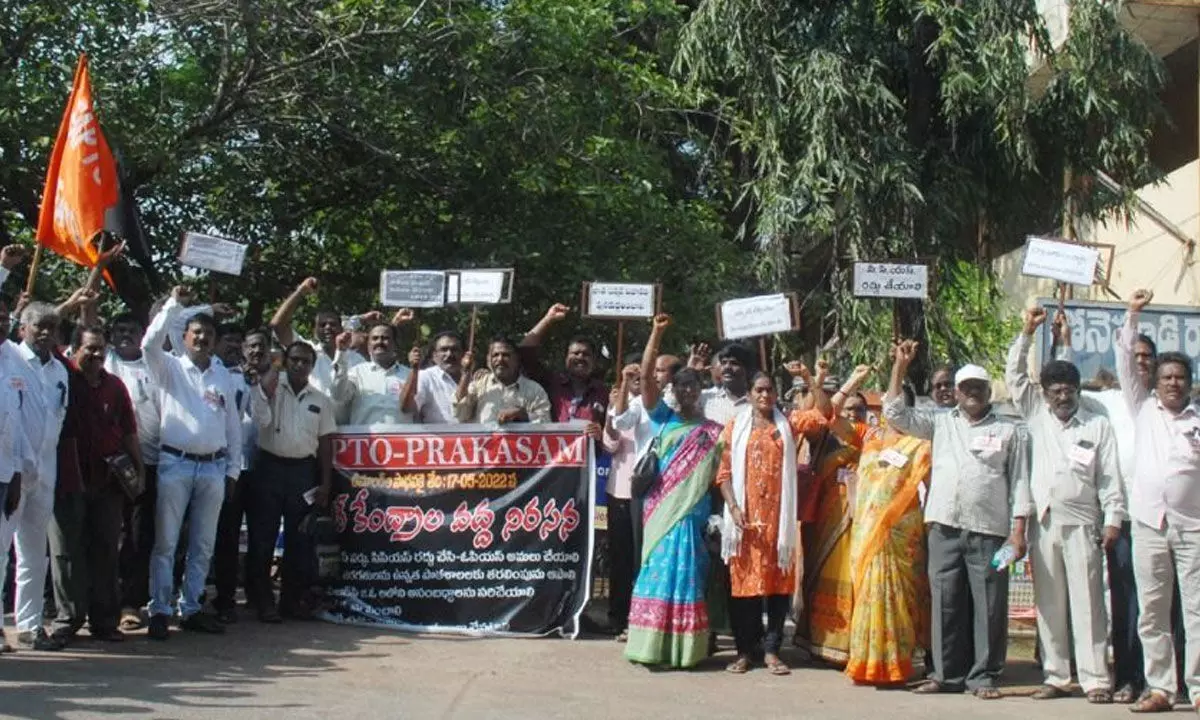 FAPTO members staging a protest at DRRM High School in Ongole on Tuesday