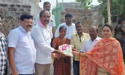 MLA Dr. Sanjay Kumar distributing Kalyana Lakshmi cheques to beneficiaries in Jagtial on Tuesday