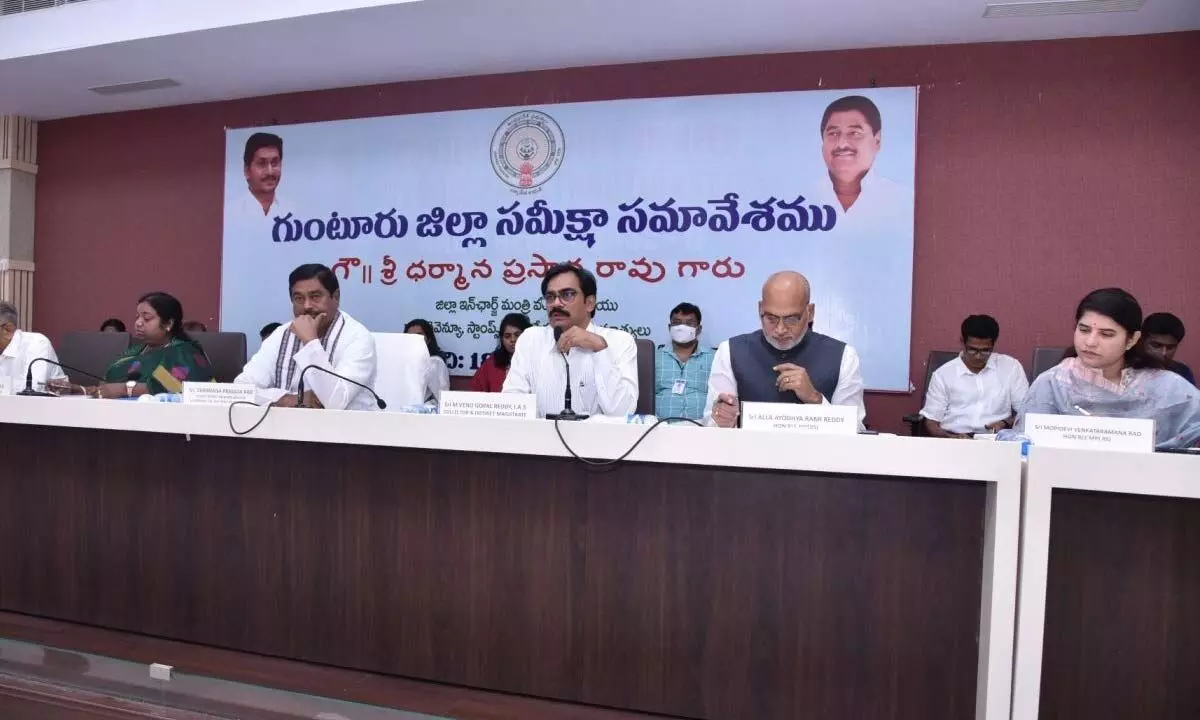 District in-charge and Revenue Minister Dharmana Prasada Rao addressing DRC meeting in Guntur on Wednesday