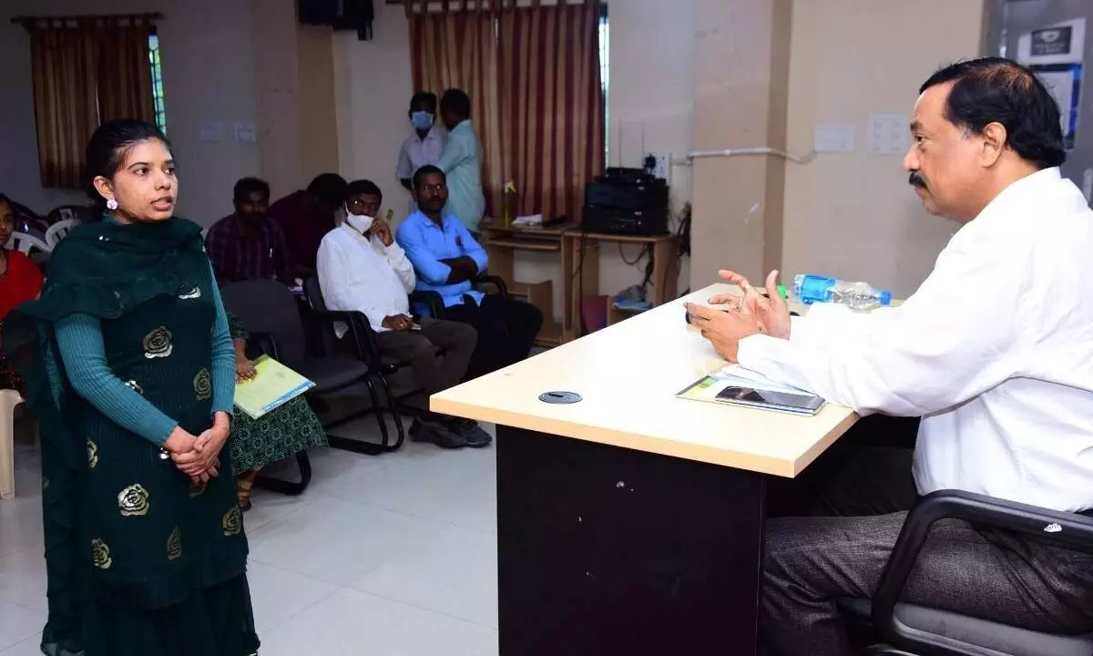 AKNU Vice-Chancellor Prof M Jagannadha Rao interacting with research scholars at the varsity seminar hall in Rajamahendravaram on Wednesday