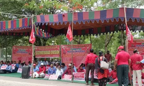 Hyderabad: Dharna staged against SCRs anti-working class attitude