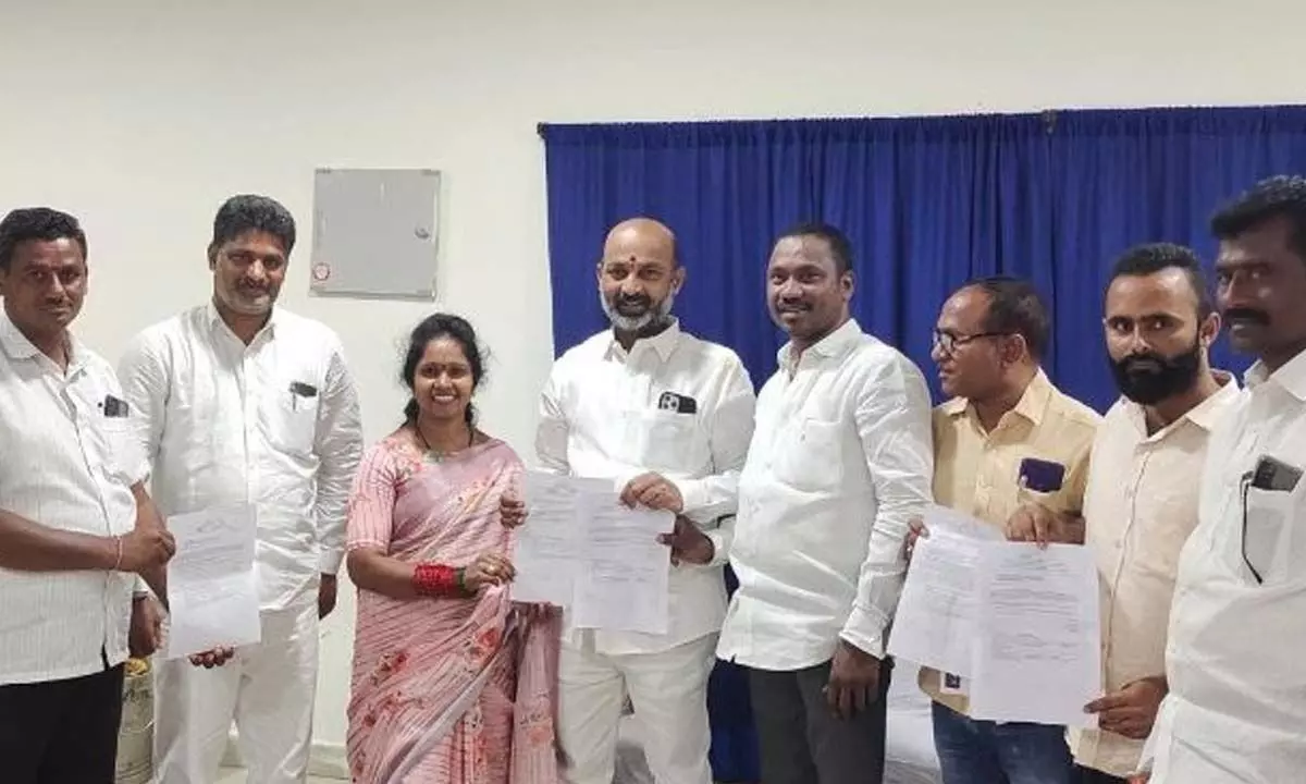 State BJP president Bandi Sanjay Kumar handing over the appointment orders to newly appointed members of the District Telecom Board Advisory Committee in Karimnagar on Thursday