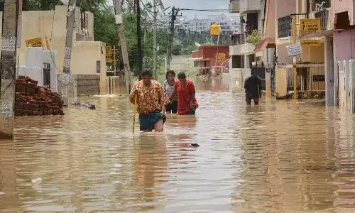 With lakes gone, Bengaluru shivers under showers