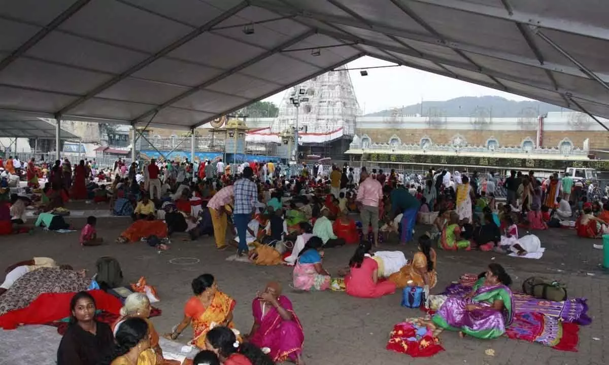 A huge number of pilgrims taking shelter at pilgrims amenities complex in Tirumala on Saturday