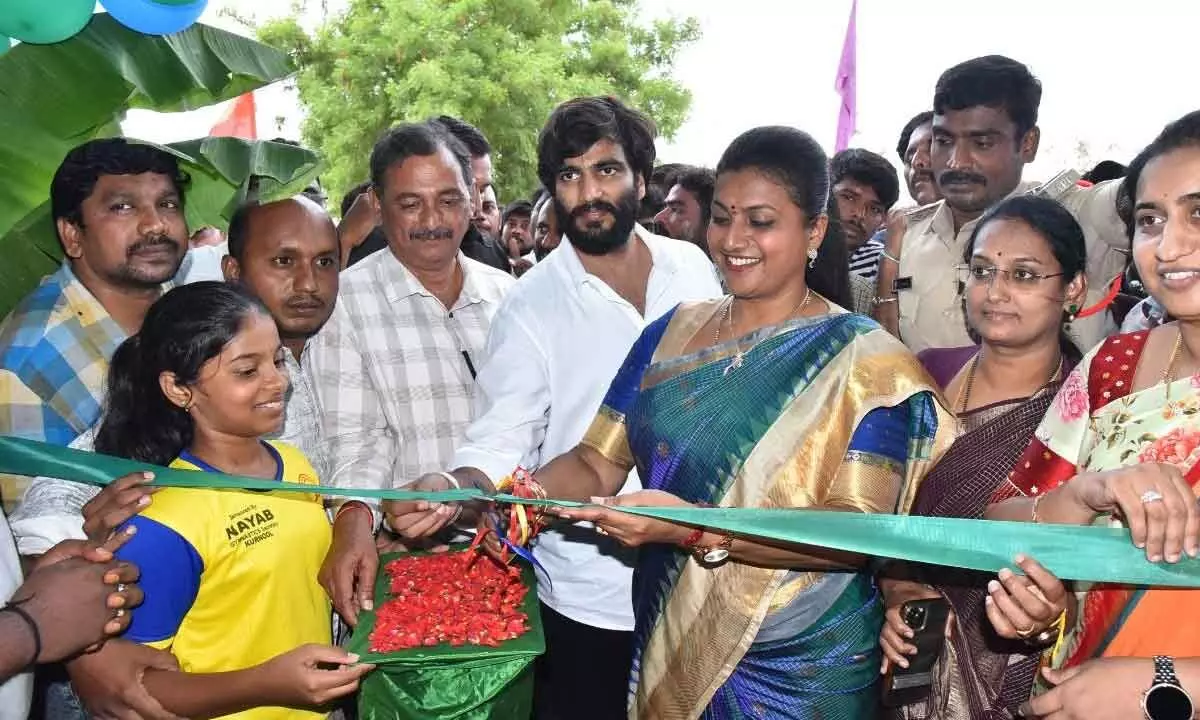 Minister R K Roja inaugurating a gymnastic equipment centre at the outdoor stadium in Kurnool on Saturday
