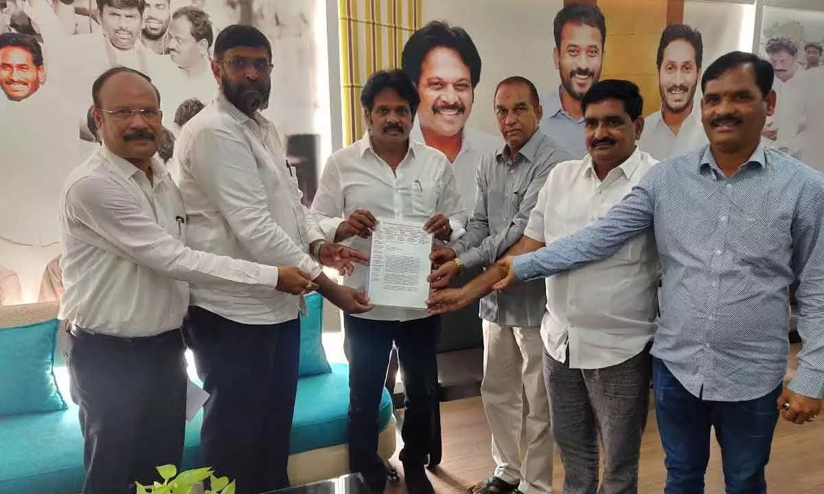 Representatives of MES Builders Association giving representation to Visakhapatnam MP MVV Satyanarayana in Visakhapatnam on Saturday